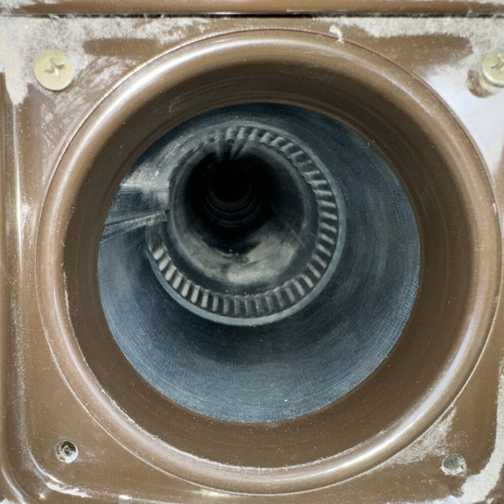 Clean dryer vent with clear airflow after professional dryer vent cleaning service